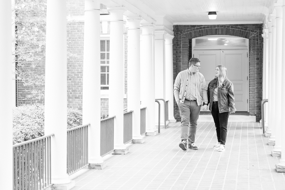 engaged couple walking on winthrop university campus