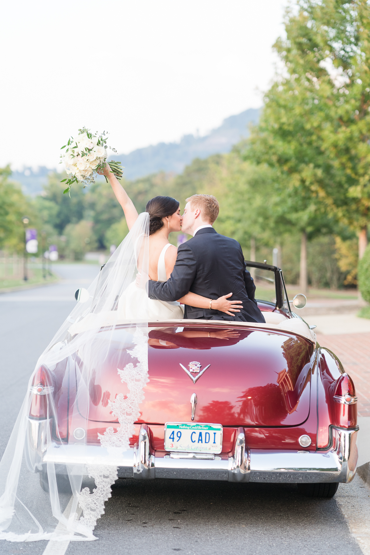 couple in the '49 Cadillac convertible